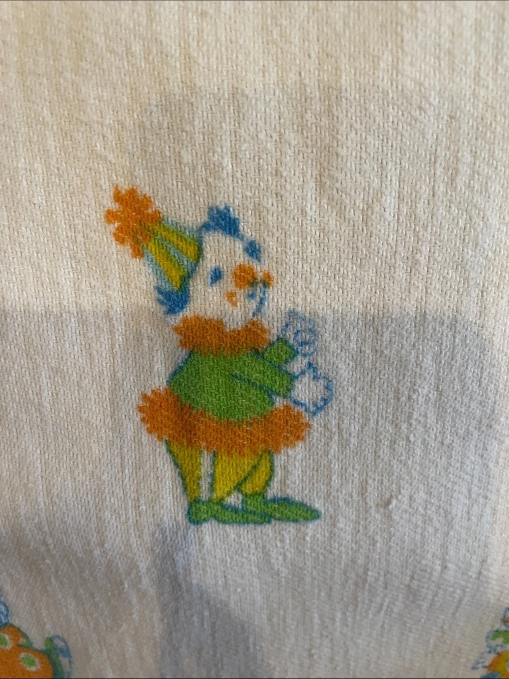 Vintage Clown Print baby’s blanket  in White, Orange & Green & blue